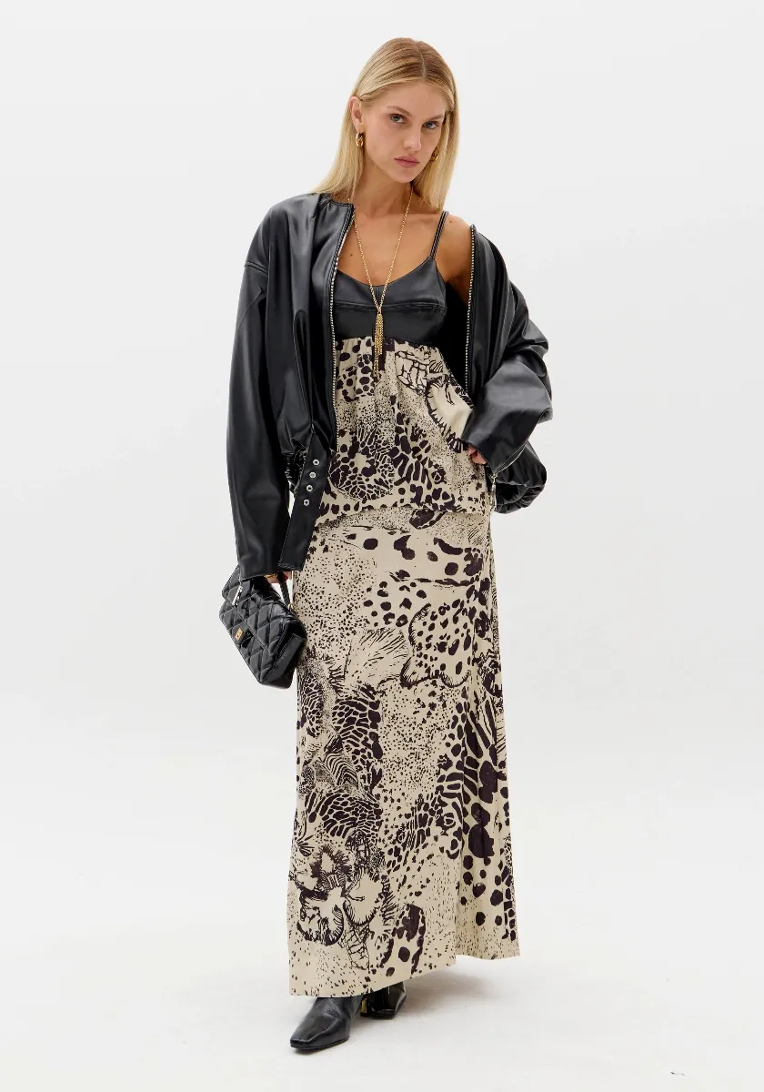 BLUSA ASSIMETRICA DE ALÇAS